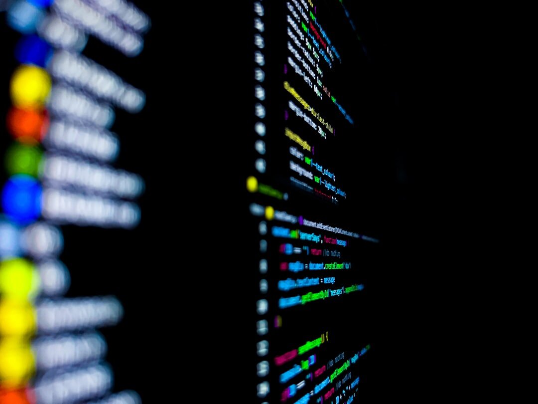 Software code on monitor screen