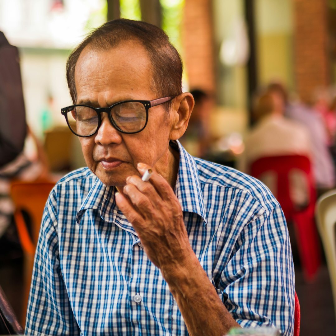 Senior male tech executive with glasses