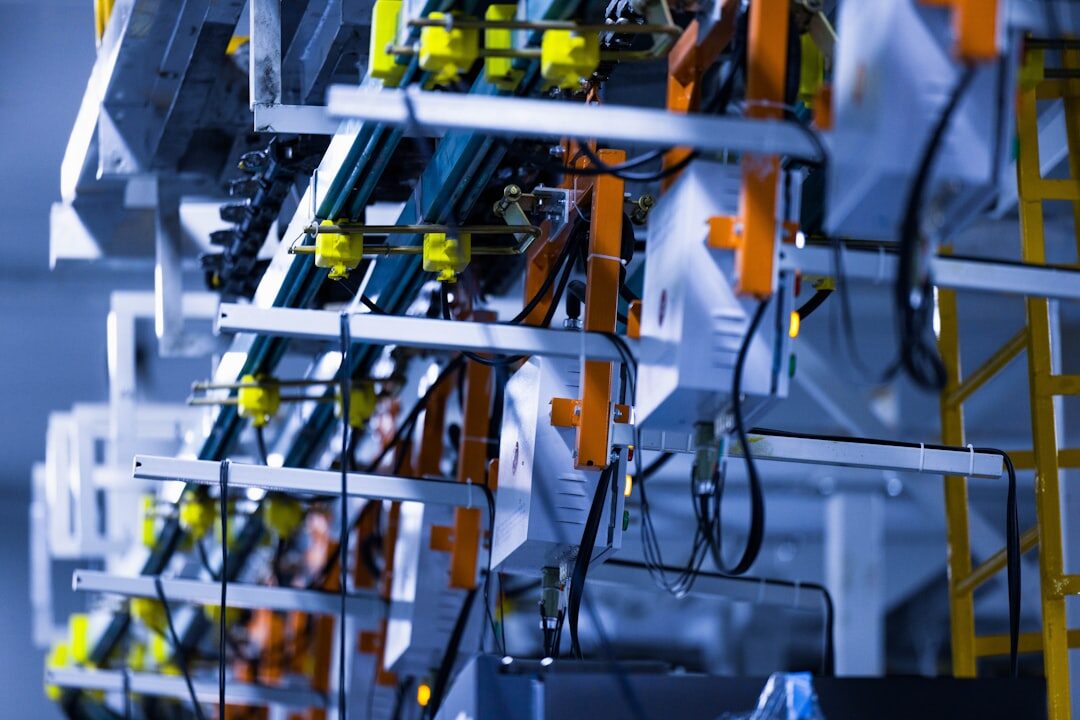 Industrial robot arm in factory performing automation